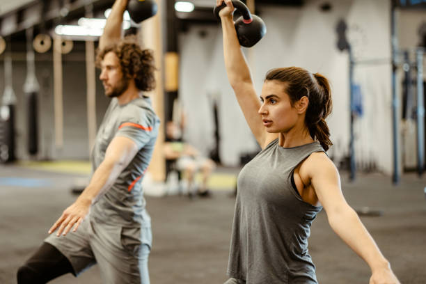 Dumbbell Swings VS Kettlebell Swings: Which Is Right For You?